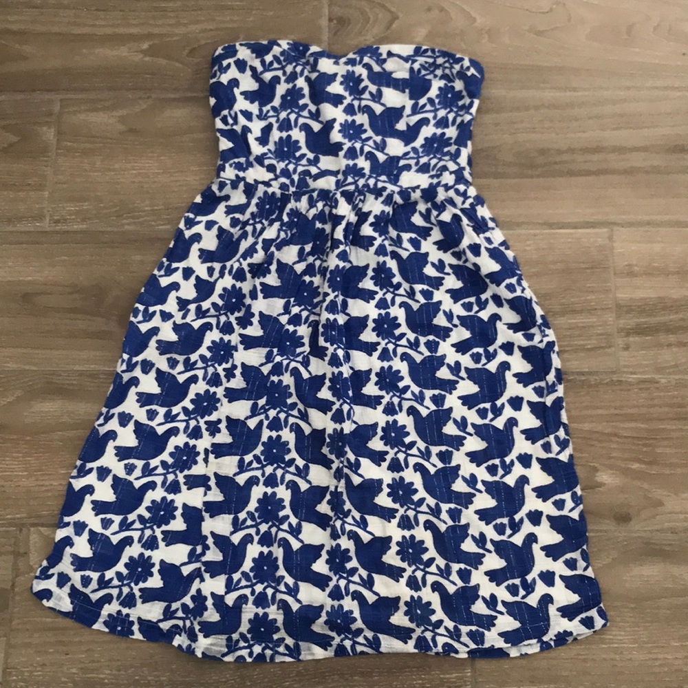 Small Strapless dress. Stays even in summer heat